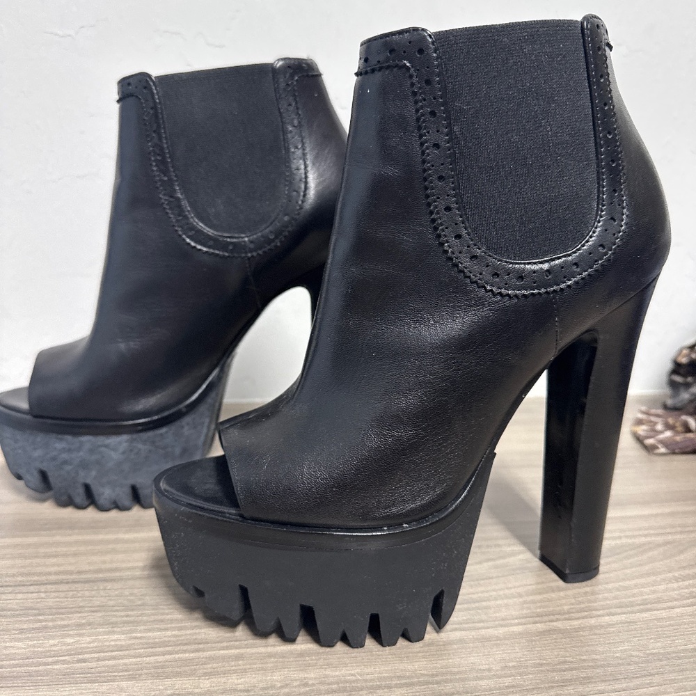 Statement Versus boots.